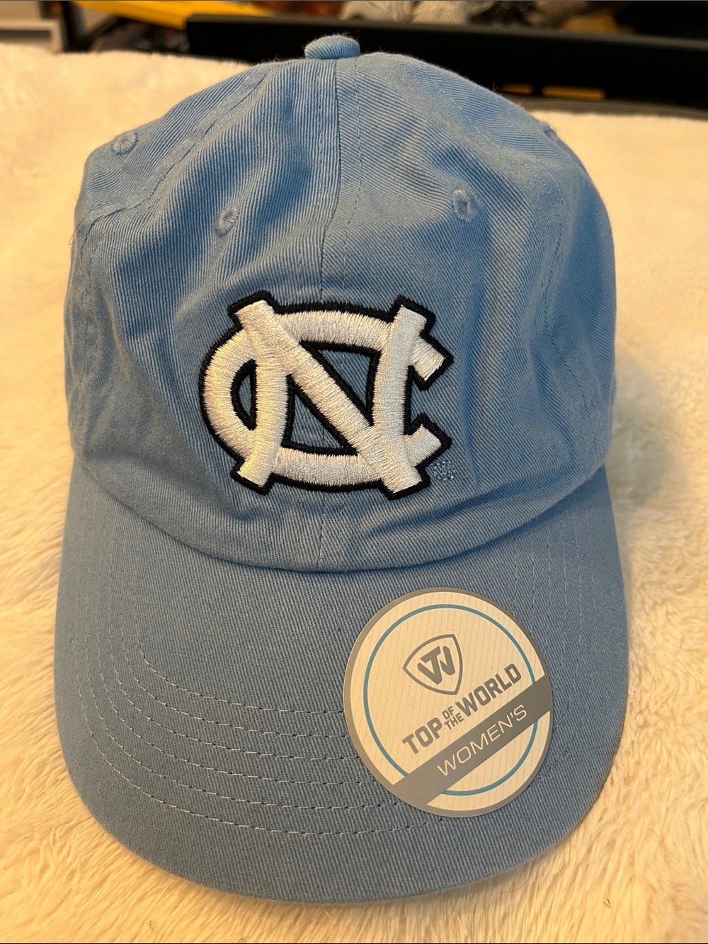 Top of the World Light Blue Woman’s Baseball Cap with White UNC Logo